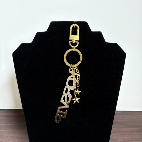 Michael Kors KorsVIP Gold Key chain/purse charm, EUC - Picture 3 of 4